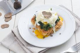 Bendecit eggs with truffle and tomino fondue